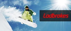 Snowboarder catching air with Ladbrokes logo overlayed
