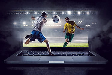 People playing soccer on a computer screen.