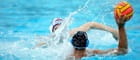 Two water polo players in the water