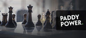 A chess set and Paddy Power logo