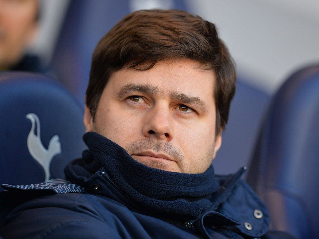 Mauricio Pochettino in the dugout as manager of Tottenham Hotspur