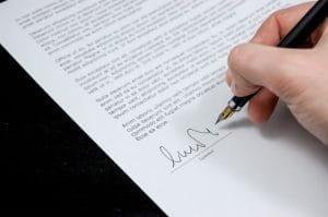 Signing a letter