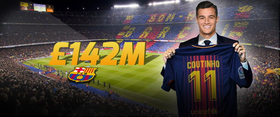 Coutinho holding a Barcelona shirt