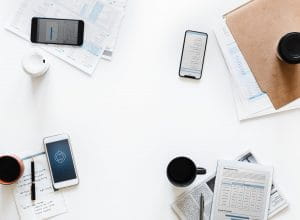 Phones and reports on a table
