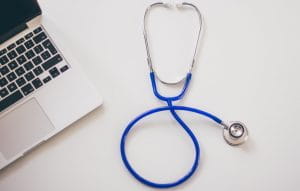 stethoscope and a laptop