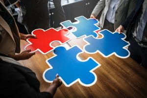Jigsaw pieces in a meeting