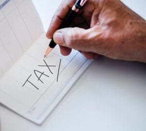 Tax written in a notebook
