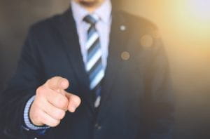 Business man pointing