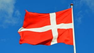 Danish flag against a blue sky