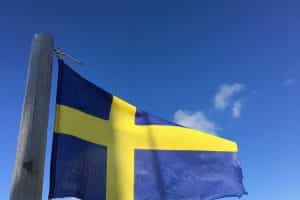 Swedish flag against a blue sky