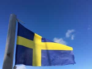 Swedish flag against a blue sky
