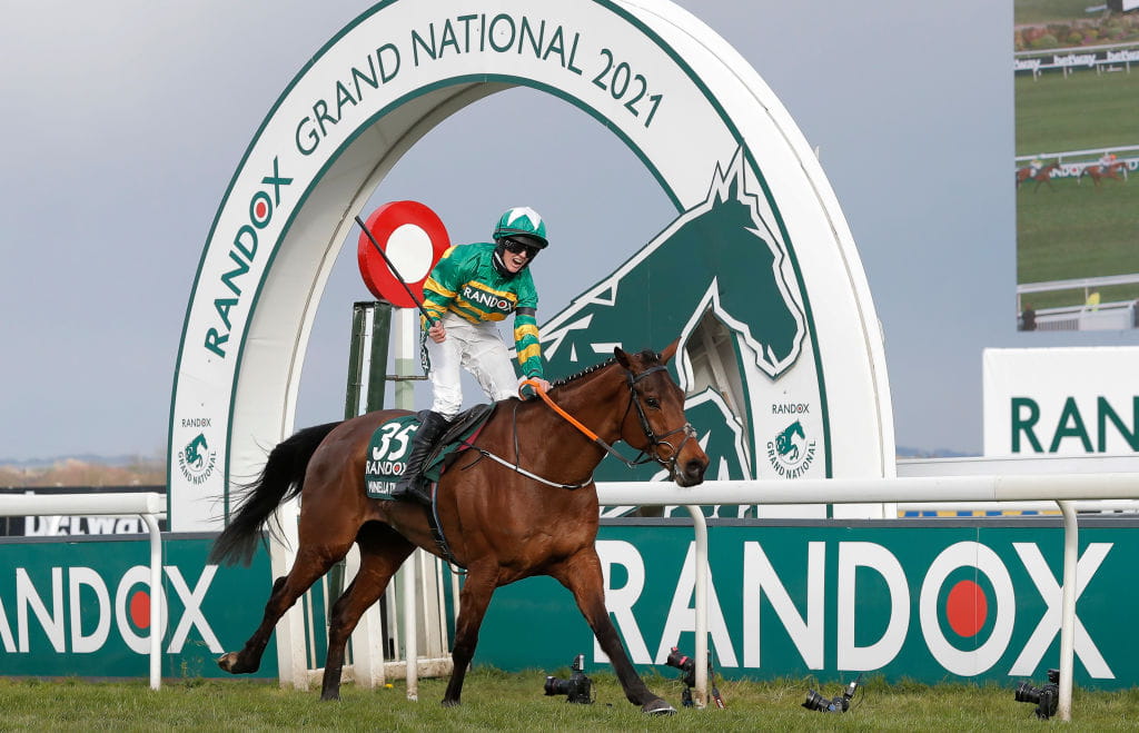 Minella Times crosses the winning post first in the 2021 Grand National.