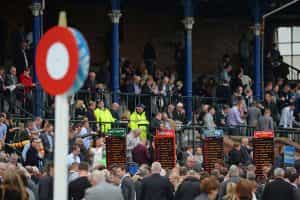 The busy betting ring at Ayr Racecourse.
