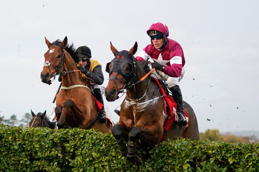 Tiger Roll jumping a hedge on Cheltenham’s cross-country course. 