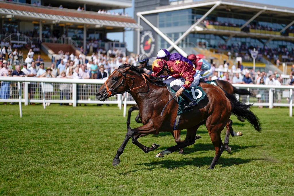 Sean Levey riding Gubbass wins the 2021 Weatherbys Super Sprint Stakes at Newbury Racecourse.