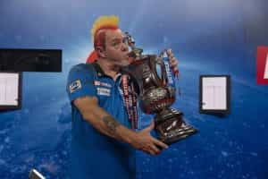 2021 winner Peter Wright poses with the World Matchplay trophy.