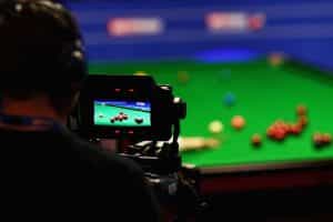  A television camera films a match during the World Snooker Championship at Crucible Theatre.