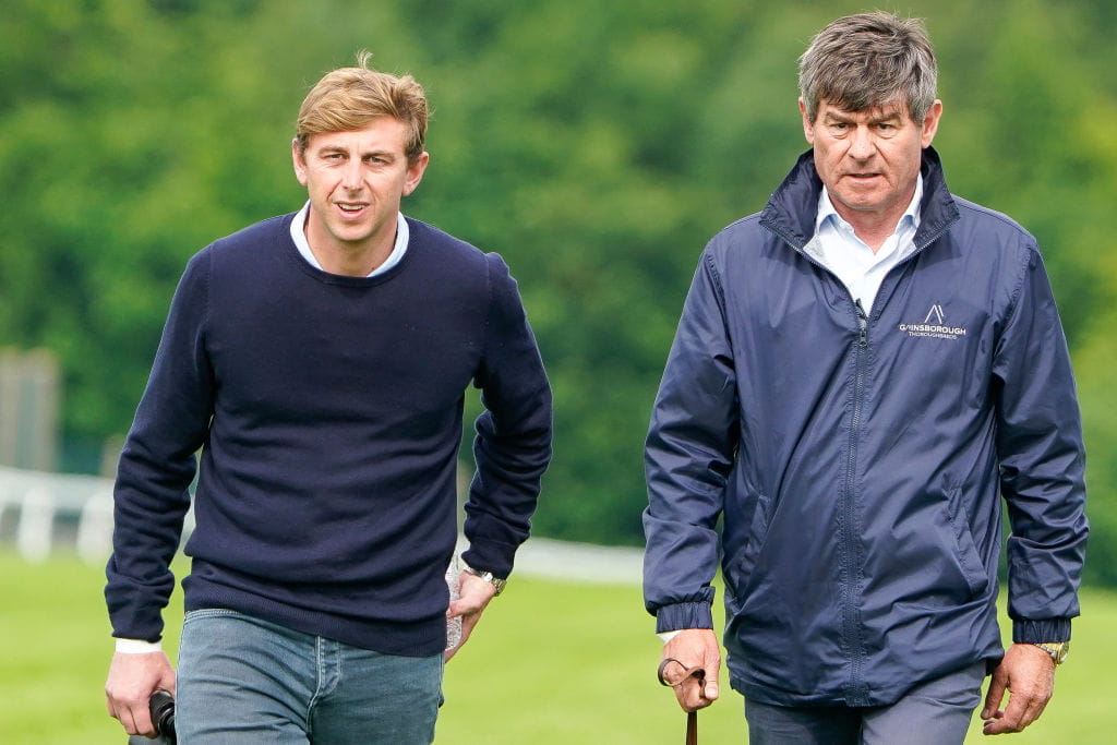 Ed Crisford with his father Simon Crisford at Epsom Racecourse.