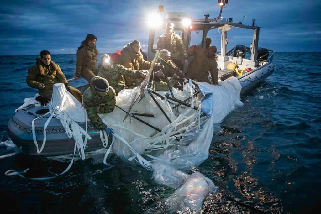 A shot down high-altitude surveillance balloon is recovered off the coast of Myrtle Beach, South Carolina. 