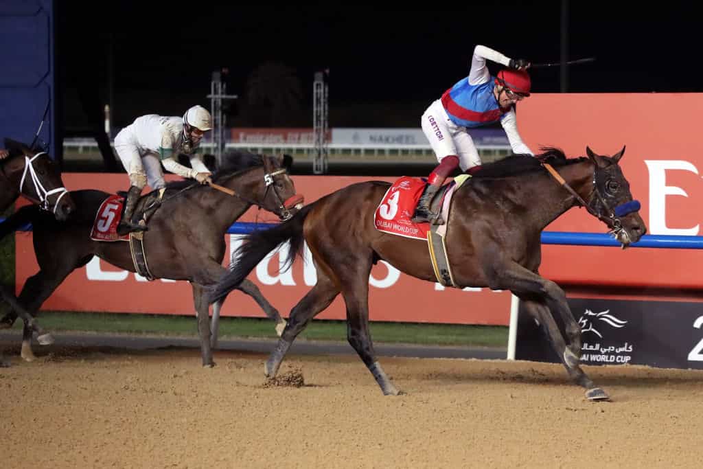 Country Grammer with Frankie Dettori up wins the 2022 Dubai World Cup at Meydan Racecourse. 