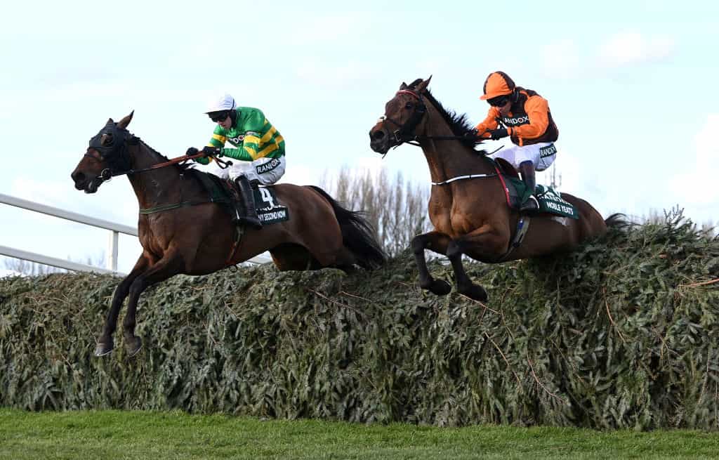 Any Second Now and Noble Yeats jumping the final fence in the 2022 Grand National.