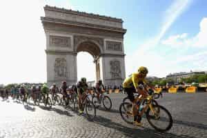 Chris Froome and the rest of the peloton pass the Arc de Triomphe during stage twenty one of the 2016 Tour de France.