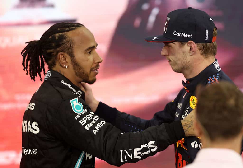 2021 F1 World Drivers Champion Max Verstappen is congratulated by runner up Lewis Hamilton.