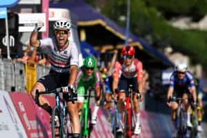 Mark Cavendish celebrates when crossing the line ahead in the final stage of the 2023 Giro d’Italia.