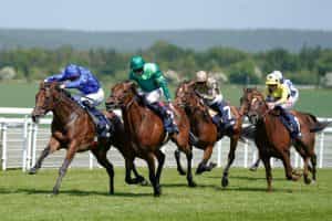 James Doyle riding King Of Conquest to victory at Goodwood Racecourse.