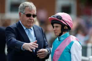 Sir Michael Stoute and Ryan Moore together at Newbury Racecourse.