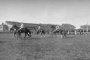 Horses circle at the start of a 1901 Doncaster race.