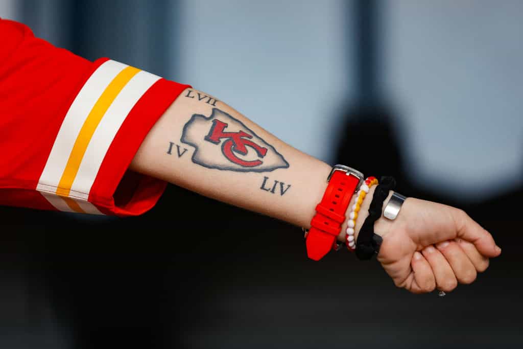 A Kansas City Chiefs fan shows off his Super Bowl victory tattoo.