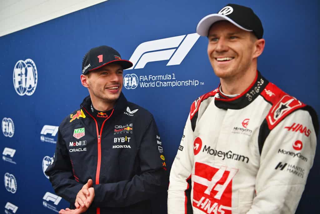 Max Verstappen shares a joke and a smile with Nico Hulkenberg.