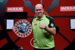 Michael van Gerwen celebrates another victory with a trophy designed to look like a roulette wheel.