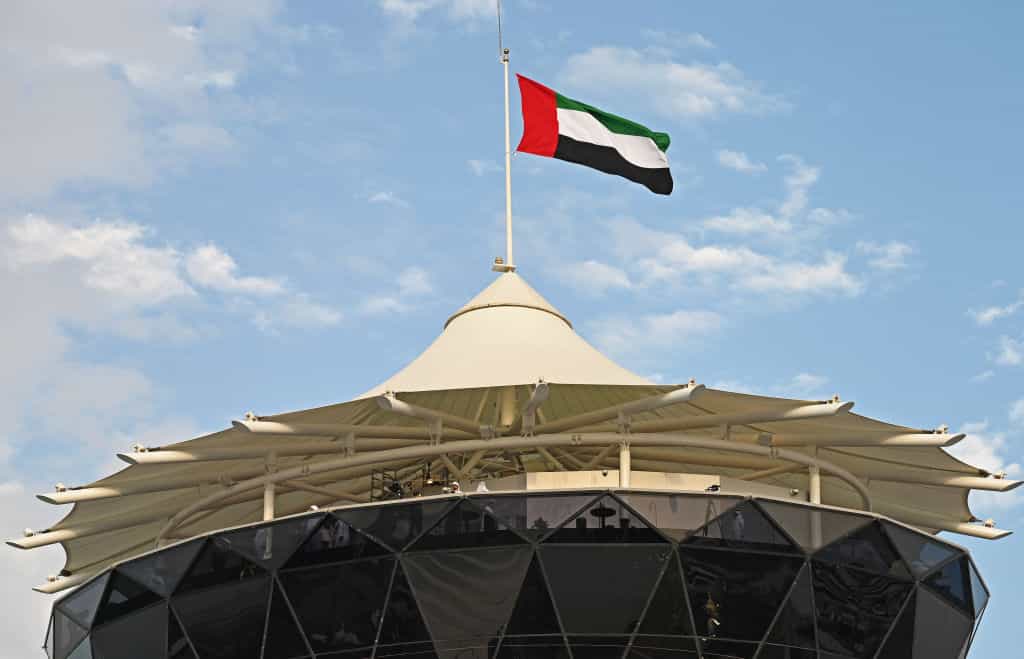 The Abu Dhabi flag flying high over the countries F1 circuit.