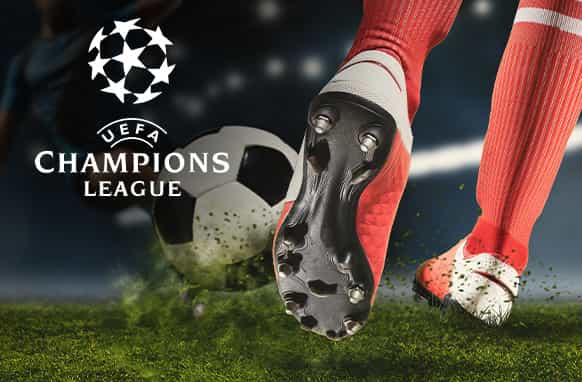 The UEFA Champions League logo displayed on the ground, symbolising the prestigious football tournament.