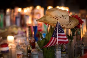 A hat is left at a makeshift memorial during a vigil to mark the Route 91 Harvest country music festival massacre.