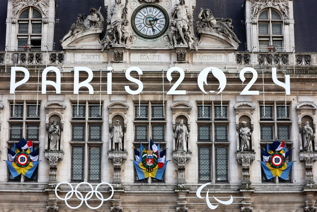 The logo of Paris 2024 Olympic Games on the facade of Paris town hall.