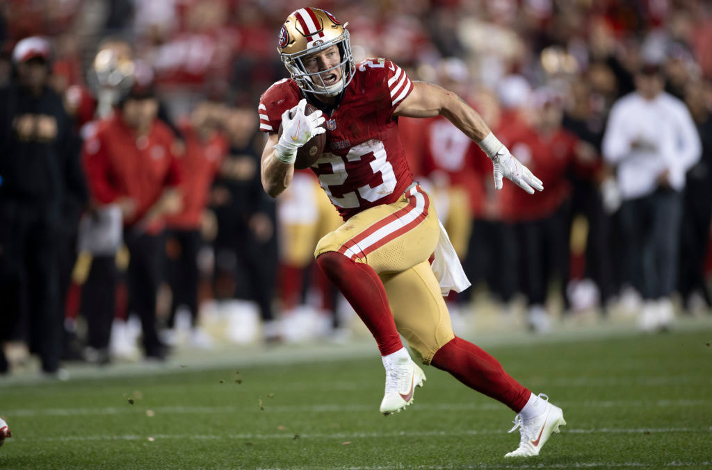Christian McCaffrey of the San Francisco 49ers rushes during the 2024 NFC Championship game against the Detroit Lions.