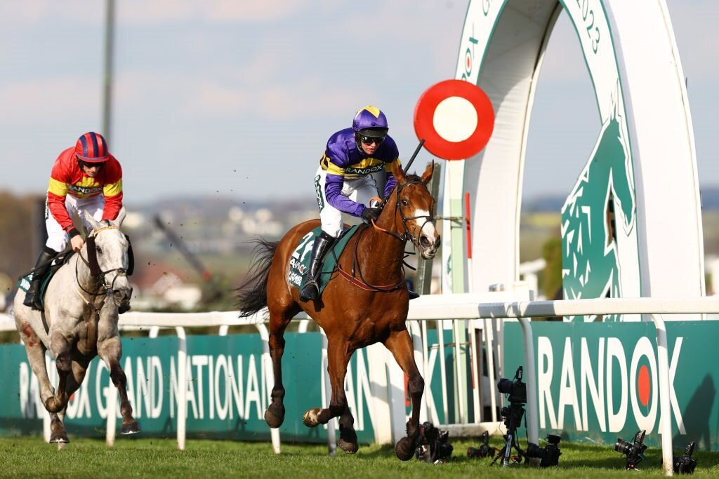 Corach Rambler is seen crossing the winning line ahead in the 2023 Grand National.