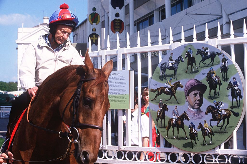 1996: Lester Piggott rides through the gates that have been named in his honour at Epsom Racecourse.