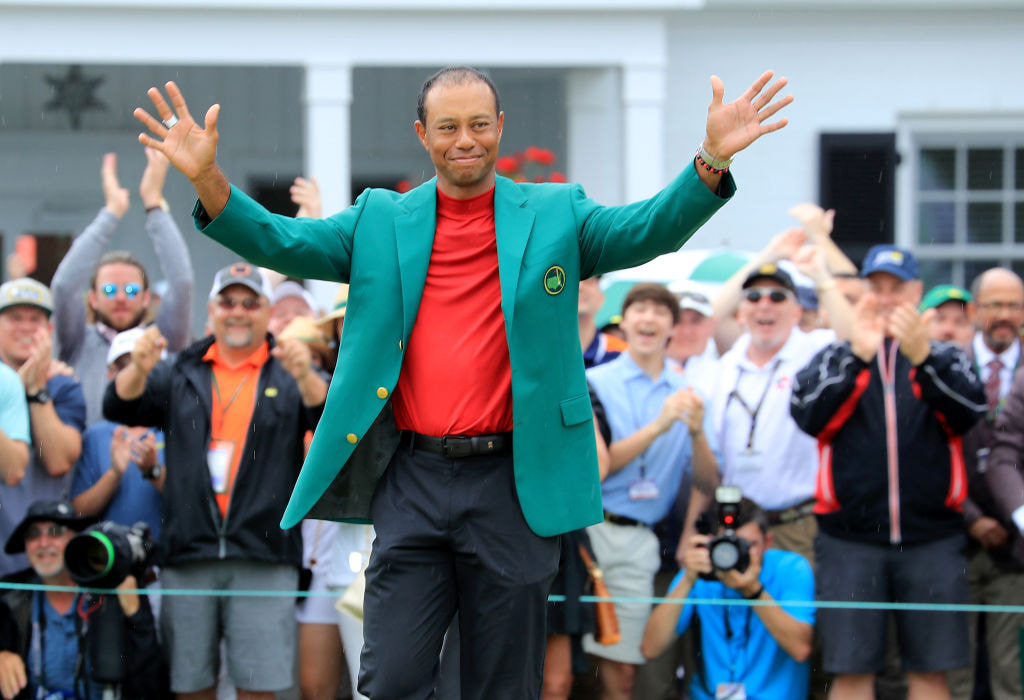 Tiger Woods waves to the crowds following the Green Jacket presentation at the 2019 Masters.