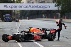 Max Verstappen kicks his tyre following a blowout at the 2021 Grand Prix of Azerbaijan.