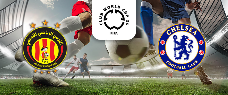 The image shows a dramatic action scene within a football stadium. Players' legs, one in red kit and the other in blue, are in mid-motion as they prepare to kick a football. Centre-top is the logo for the FIFA Club World Cup 2025. On the left side is the emblem of Espérance Sportive de Tunis, featuring Arabic text and the club's red and yellow colours. On the right is the emblem of Chelsea Football Club, with the iconic blue lion and English text. The stadium is filled with fans and the scene is captured from a dynamic, ground-level perspective.