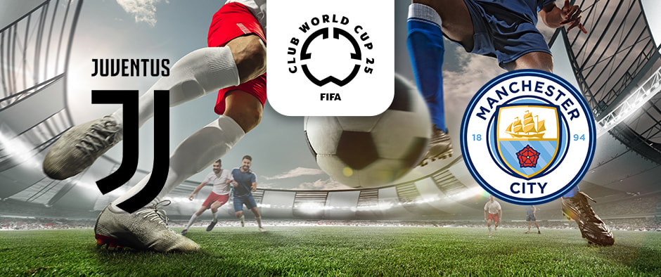 The image captures an intense football action scene within a stadium. Legs of two players are visible, one in red kit and the other in blue, as they vie for control of a football. The FIFA Club World Cup 2025 logo is positioned at the centre-top of the image. On the left side is the emblem of Juventus, featuring the distinctive black and white "J" logo. On the right side is the emblem of Manchester City, displaying a ship, red rose, and the club's signature light blue colours. The stadium is bustling with energy, providing a dynamic backdrop for the moment.