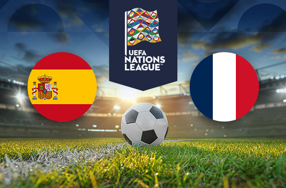 An image depicting the UEFA Nations League featuring a soccer ball on a grass field, with the Spain flag on the left and the France flag on the right. The UEFA Nations League logo is displayed above the field, set against a backdrop of a stadium under a cloudy sky.
