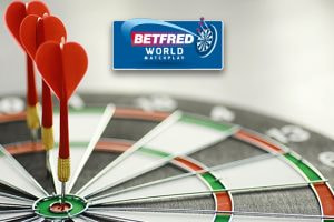 The image showcases a dartboard with three red darts expertly positioned in the bullseye. Above the dartboard is the Betfred World Matchplay logo, indicating a connection to an esteemed darts competition. The scene highlights the precision and skill vital to the game of darts.