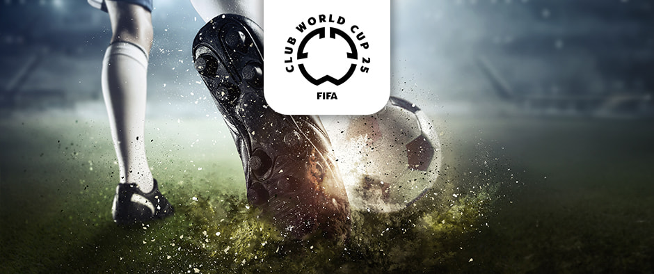 A high-intensity close-up image showing a football player in action, as their black boot powerfully strikes a black-and-white football on a wet, grass-covered pitch, sending mud and water spraying. The atmosphere is charged under the stadium lights, capturing the excitement of the game. Above the scene is the FIFA Club World Cup 25 logo, indicating the prominence of the competition.
