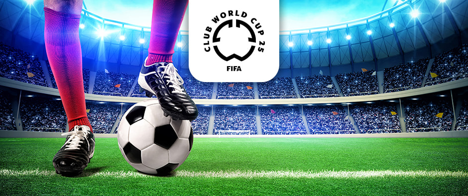 The image displays a football stadium filled with spectators under bright lighting with a clear sky. In the foreground, a football player wearing red socks and black football boots is poised with one foot resting on a football. At the top centre of the image is the logo for the FIFA Club World Cup 2025, creating a focal point above the action on the pitch. The setting conveys a sense of anticipation and readiness for the match.