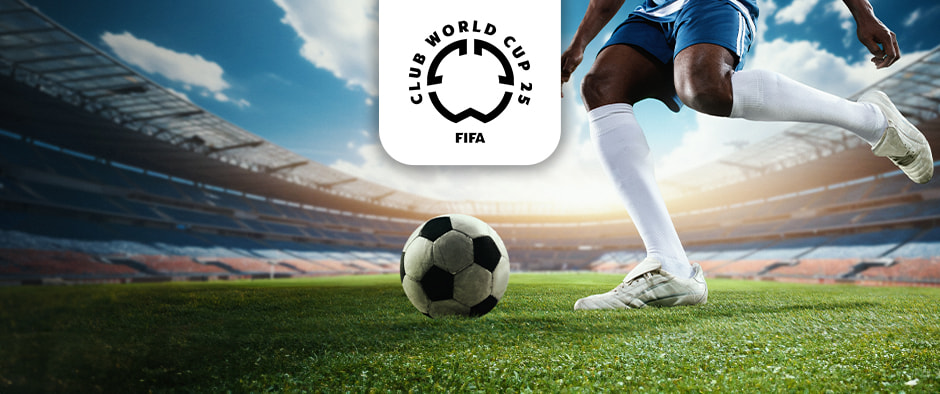 The image portrays a football player wearing blue shorts, poised to kick a football on a lush green pitch inside a stadium. The stadium is bathed in sunlight, with stands visible in the background. Centrally positioned at the top is the logo for the FIFA Club World Cup 2025. The scene captures the anticipation and readiness of the player to engage in the match.